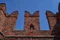 View of the Castel Vecchio Bridge connected to Castelvecchio Castle along Adige river in Verona, Italy - July, 2022 Royalty Free Stock Photo